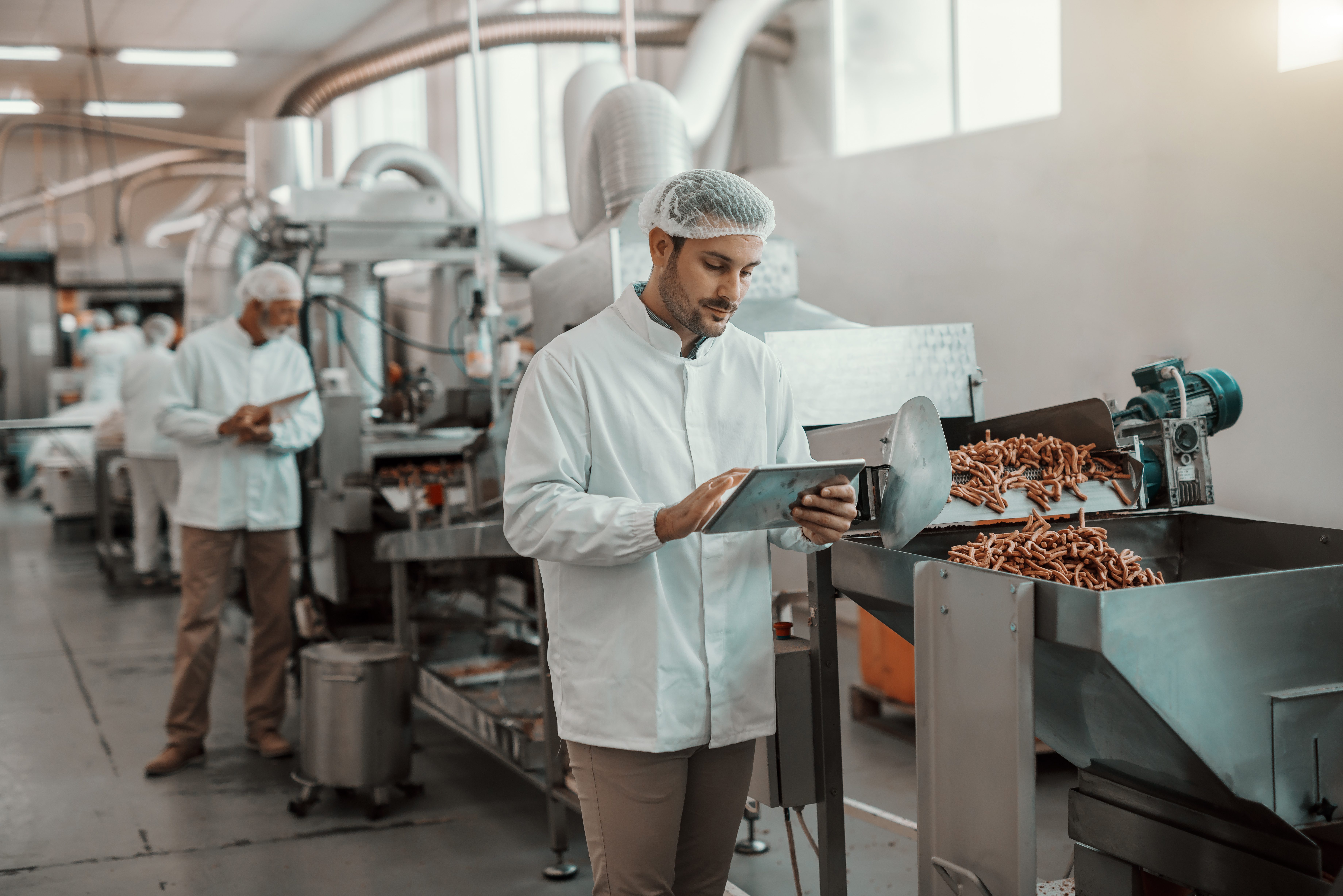 man working in food manufacturing plant