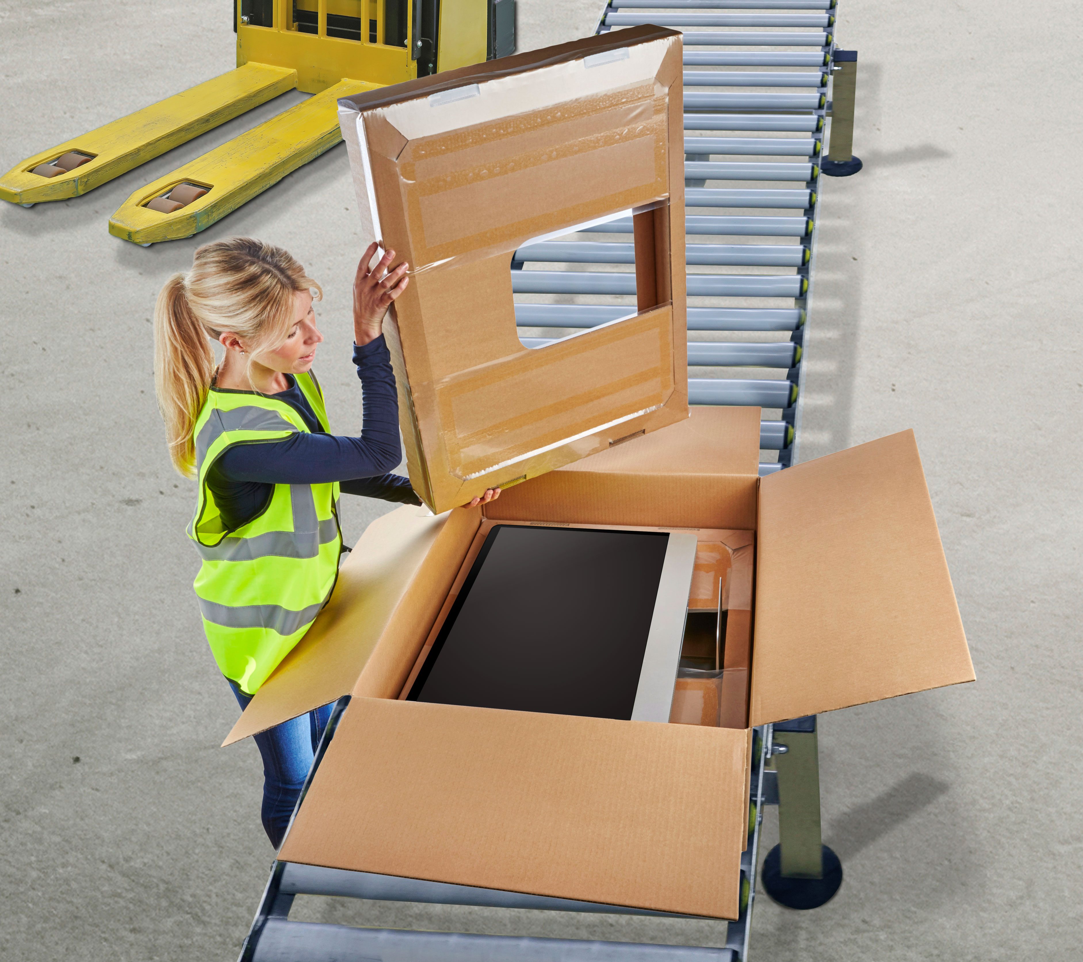 Large High-Tech Computer Screen Being Packaged to Ship from Warehouse