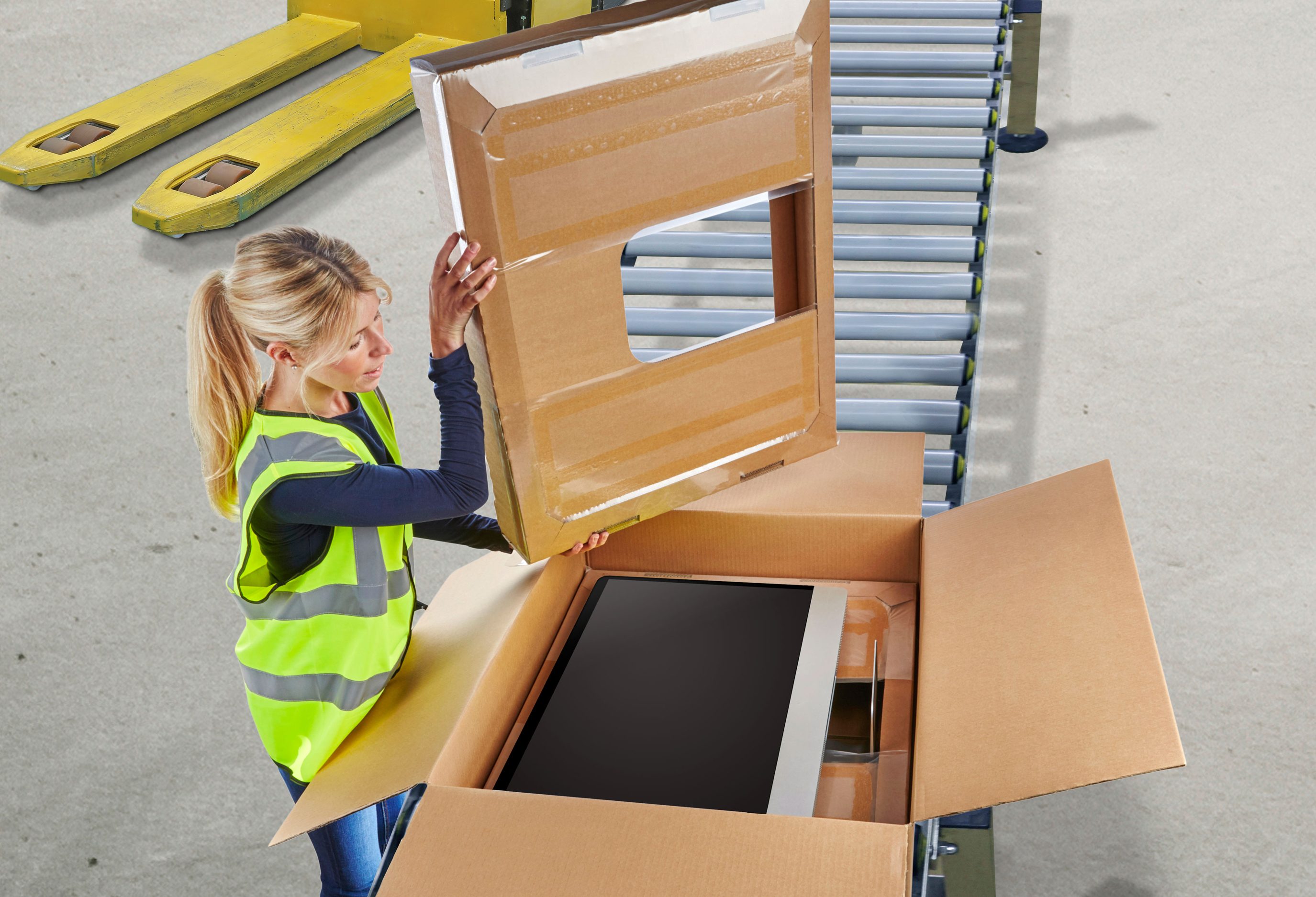 Large High-Tech Computer Screen Being Packaged to Ship from Warehouse