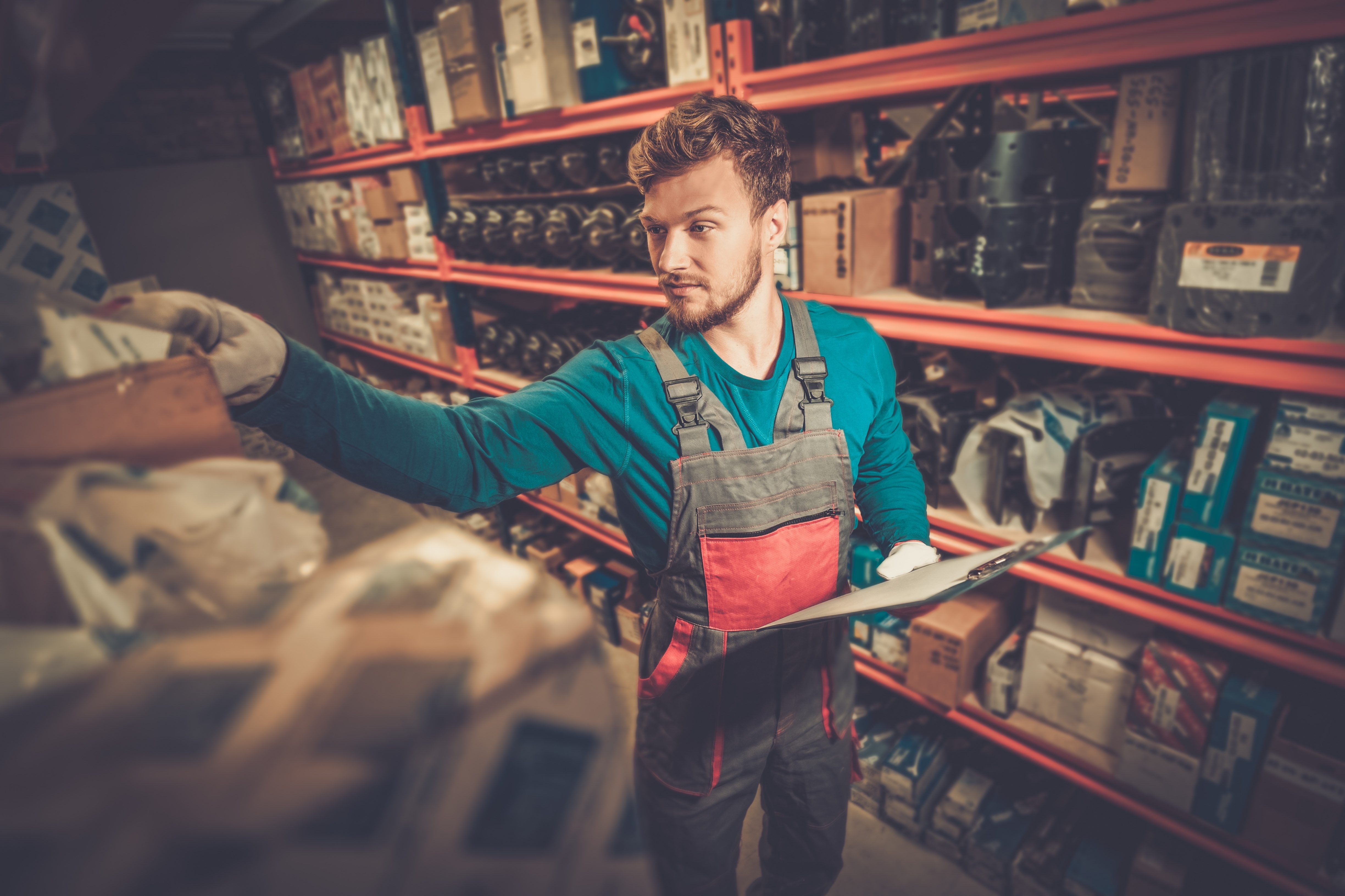 Autoparts Warehouse Employee getting item to pack and ship for online purchase