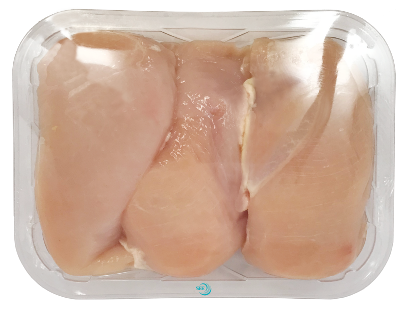 CRYOVAC Preformed clear tray with overwrap film over chicken breasts