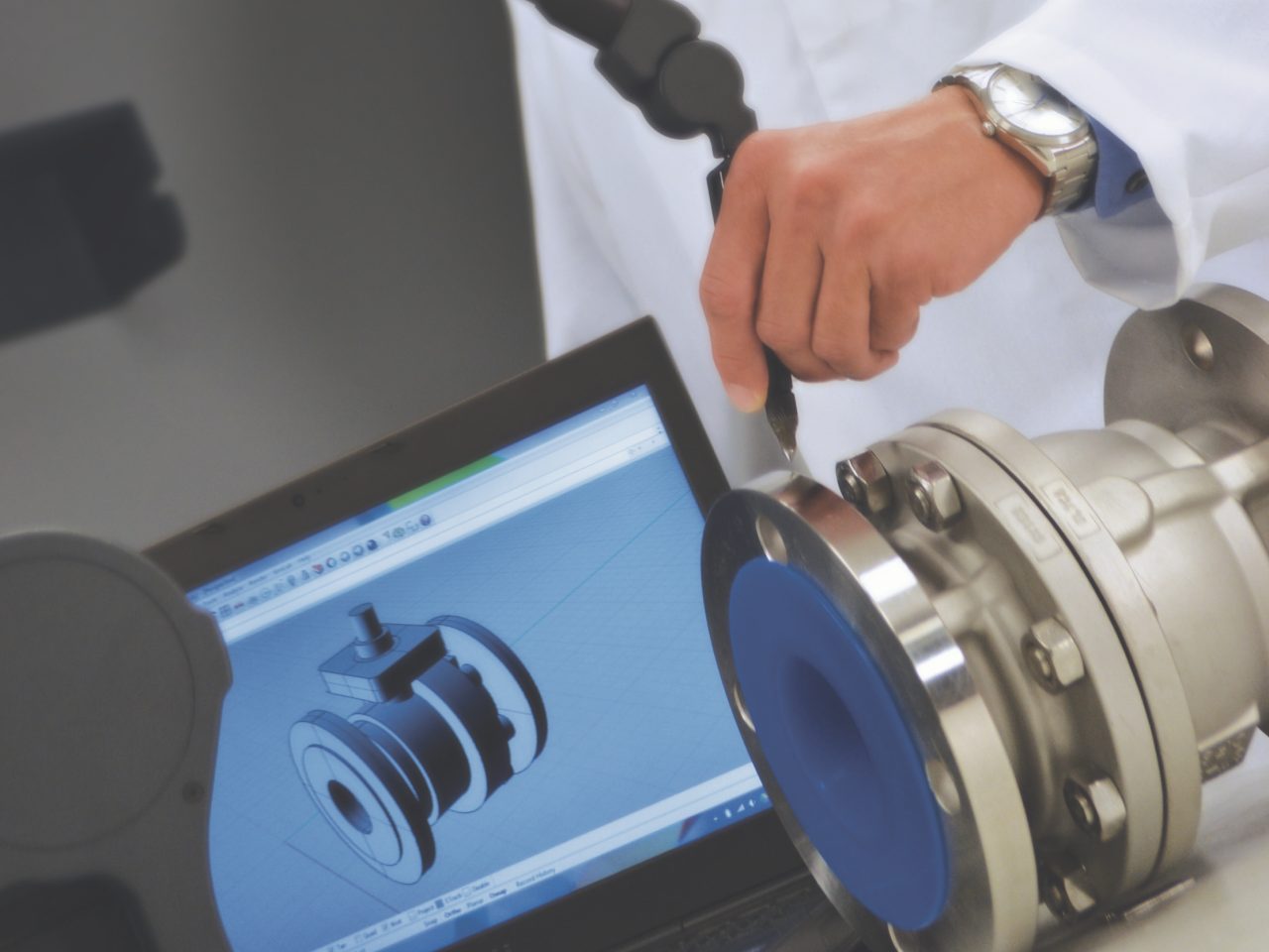 man in lab coat inspecting packaging design